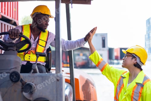 Preview: Engineer loads goods by forklift to stack containers