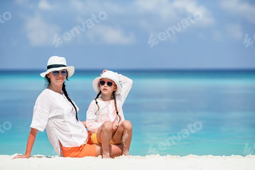Preview: Beautiful mother and daughter on Caribbean beach