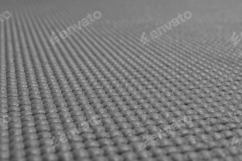 Vista previa: Textura de tapete deportivo gris como fondo, primer plano