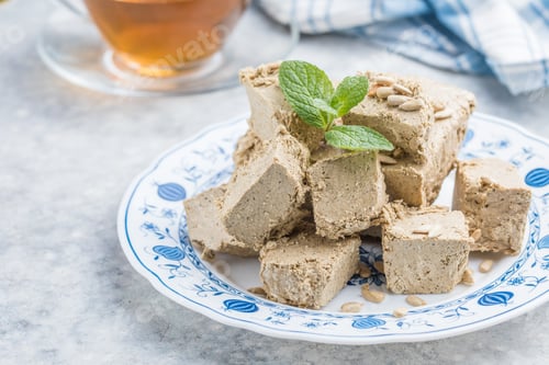 Preview: Sunflower halva close-up. Sweet oriental dessert halva. Sweets for tea.
