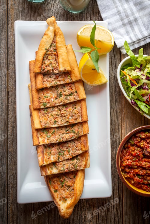 Preview: Turkish pide with minced meat, Turkish name; Kiymali Pide. Traditional Turkish cuisine.
