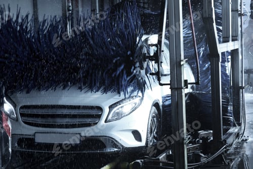 Preview: Modern auto undergoing cleaning at car wash
