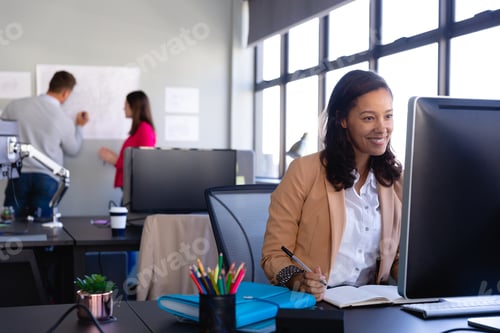 Preview: Business people working together in office