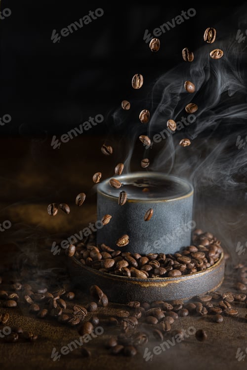 Preview: Coffee beans fly into a cup with steam