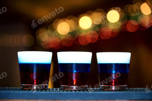 Preview: Three alcoholic shots at the bar