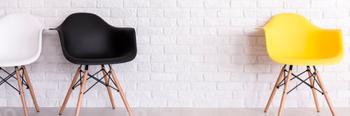 Preview: Brick wall and three armchairs