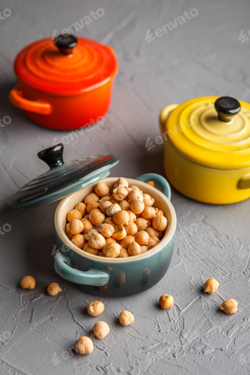 Preview: Chickpeas in asaucepan on a gray background