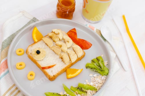 Preview: Funny cute fish shape sandwich toast bread with banana. Kids childrens dessert breakfast lunch food