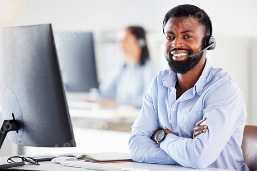 Preview: Portrait of one happy young african american male call centre telemarketing agent talking on a head
