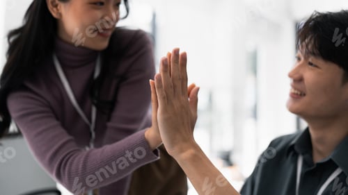 Preview: business team people give high five happy excited in teambuilding celebrate corporate teamwork