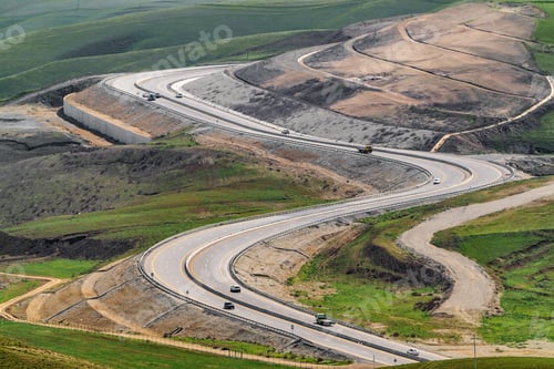 Preview: A winding road on a mountain pass