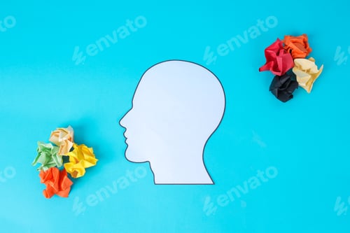 Preview: Flat Lay Of Head Shape With Crushed Colored Paper Symbolizing Frustration And Overthinking