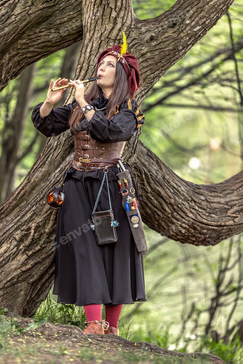 Preview: A woman with a flute. A girl in a burgundy beret with feathers plays a pipe.Fantasy.Medieval dress