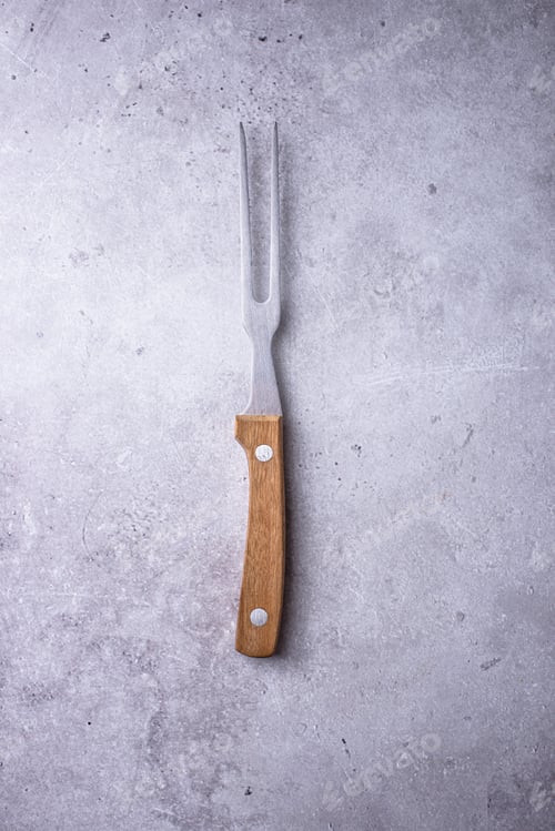 Preview: Meat fork on gray background
