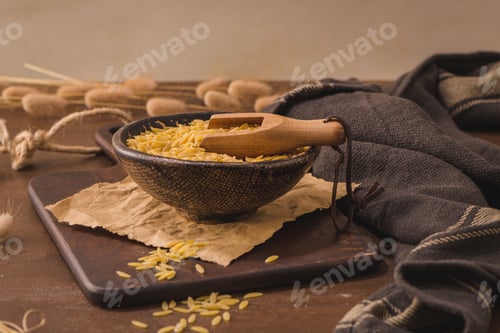 Preview: Dry risoni pasta in a ceramic bowl