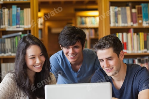 Preview: Students Sitting Looking At A Laptop At The Library