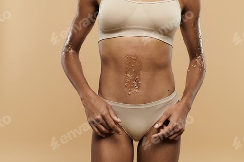 Preview: Confident african american woman poses in lingerie