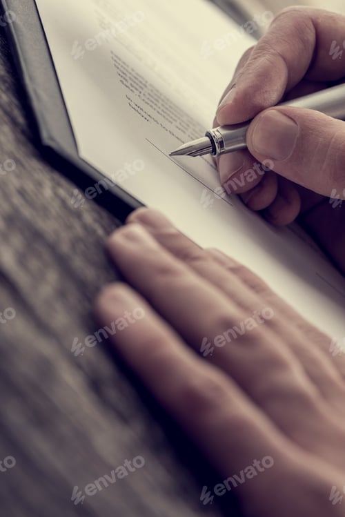 Preview: Hands putting a signature