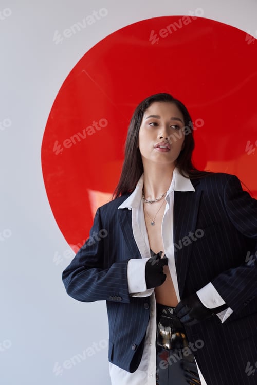 Preview: fashion photography, young asian model in white shirt and blazer posing in gloves and latex shorts