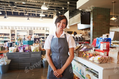 Preview: Portrait Of Female Employee Working In Delicatessen