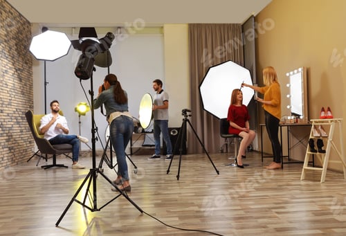 Preview: Photo studio with professional equipment and team of workers