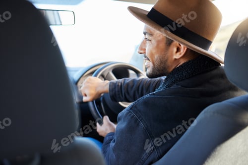 Preview: All he needed was a wheel in his hand. Shot of a young man driving his car.