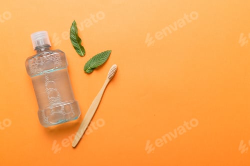 Preview: Mouthwash and fresh mint on colored background, top view with copy space for text