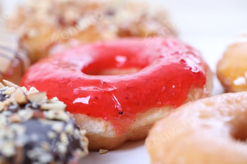 Preview: Chocolate Almonds Strawberry Donut Isolated On White Background