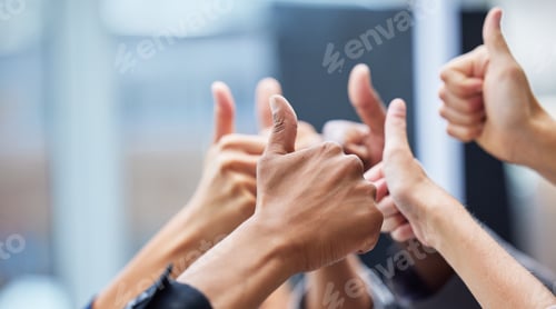 Preview: Shot of a group of coworkers with their arms raised in the thumbs up gesture