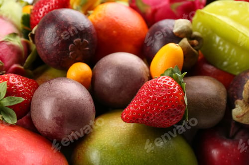 Preview: Assortment of fresh exotic fruits as background, closeup