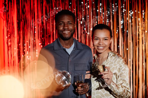 Preview: Portrait of Joyful Young Couple at Disco Party