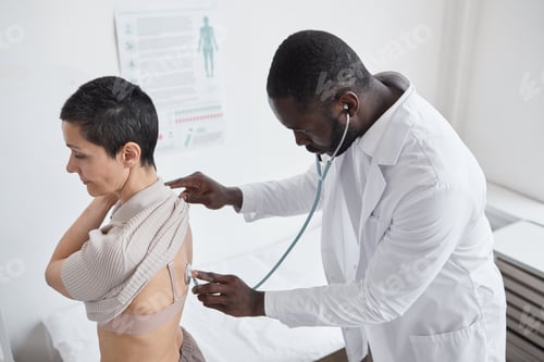 Preview: Doctor examining the patient at hospital