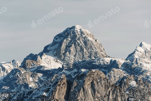 Preview: Rocky snowcapped peak of Mount Mangart in Julian alps in Slovenia