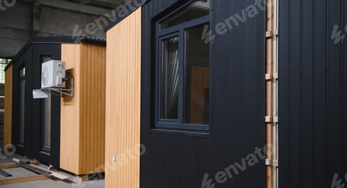 Preview: Prefabricated mobile wooden house at construction site