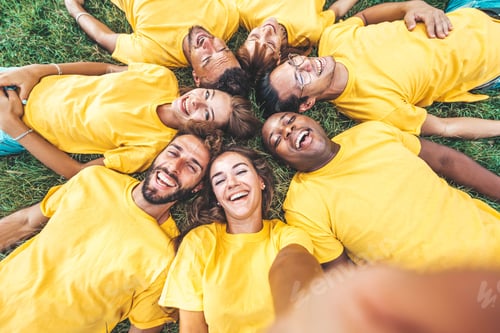Preview: Multiracial community of young people smiling together at camera