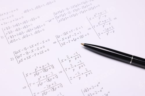 Preview: Sheet of paper with mathematical formulas and pen