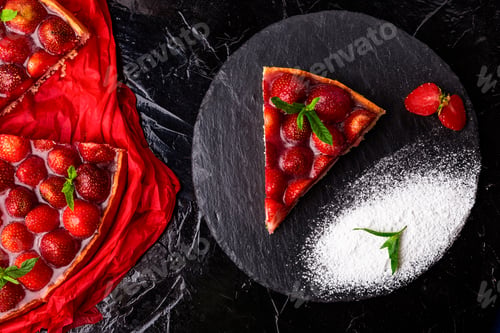 Preview: Strawberry pie on black slate plate.