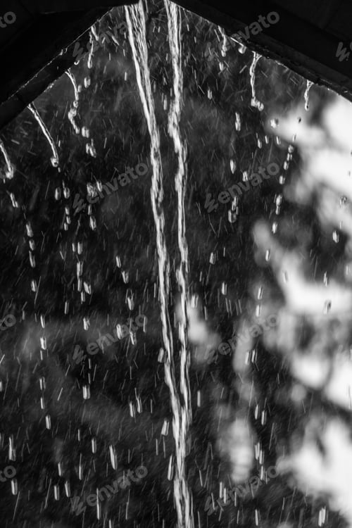 Preview: Raindrops Stream Off Of A Roof In Renton, Washington.