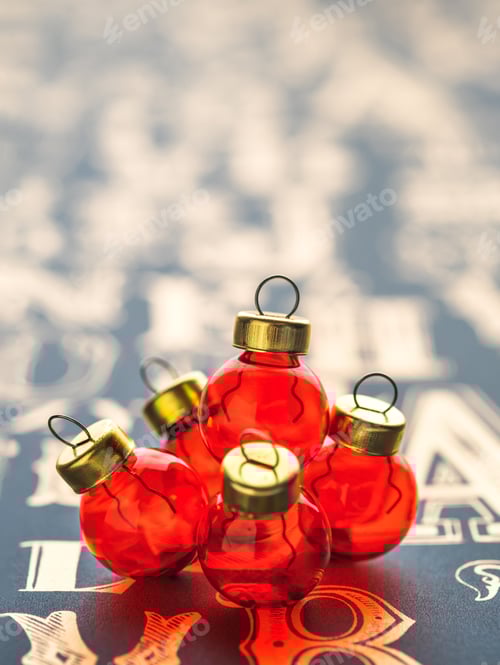 Preview: Christams gold pine conre and red glass ball decoration on vintage type pattern table.