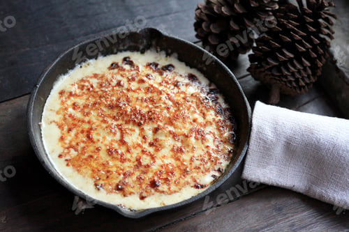 Preview: Baked macaroni pasta cheesy sauce in rustic pan, American mac and cheese.