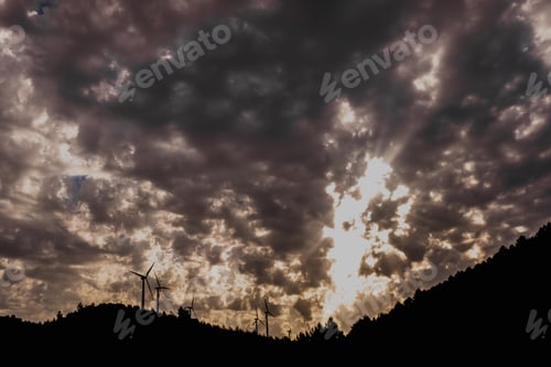 Preview: Wind turbines viewed from below help decontaminate the air.