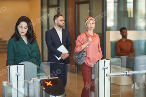Preview: People Passing Turnstile Gate