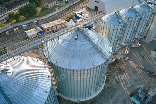 Preview: Aerial view of industrial ventilated silos for long term storage of grain and oilseed.