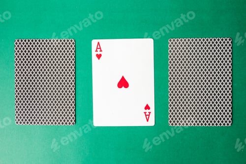 Preview: Playing card and back designs on green background. Free space for text
