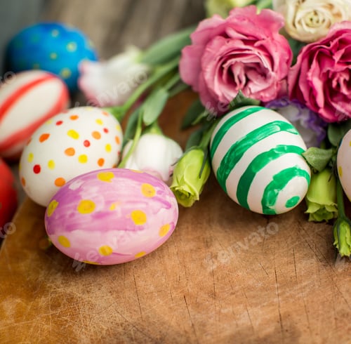 Preview: Colorful easter eggs and lisianthus on wooden table