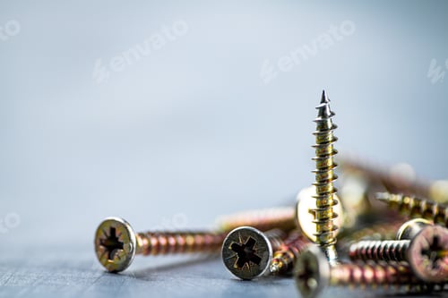 Preview: A bunch of self-tapping screws on the table.