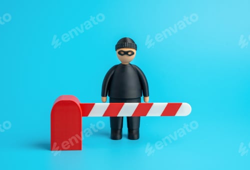 Preview: A masked thief behind a barrier gate. Stop crime. Cyber protection from hackers