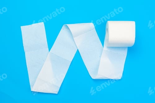 Preview: Roll of toilet paper on blue color background
