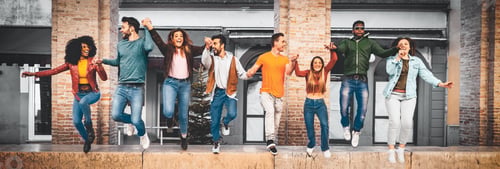 Preview: Joyful Friends Jumping Together in the City
