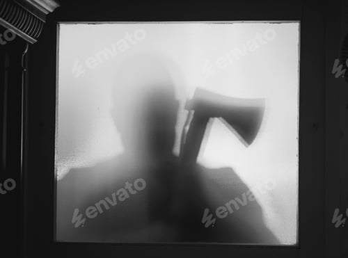 Preview: Man killer with an axe in his hand. Creepy background
